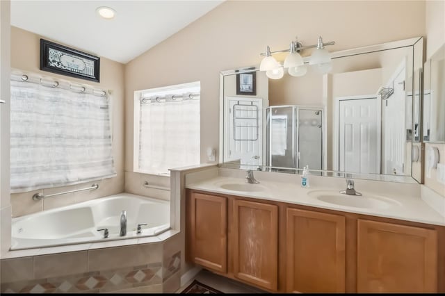 2481 Deer Creek Blvd, Saint Cloud, FL 34772 - bathroom with vaulted ceiling, double vanity, a bath, and a stall shower