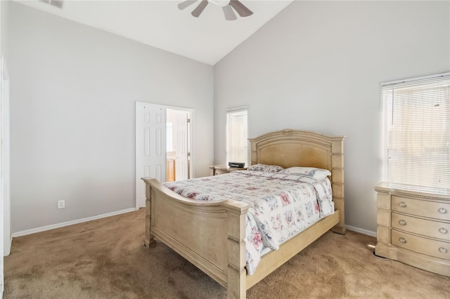 2481 Deer Creek Blvd, Saint Cloud, FL 34772 - bedroom with high vaulted ceiling, carpet floors, baseboards, ceiling fan, and ensuite bathroom
