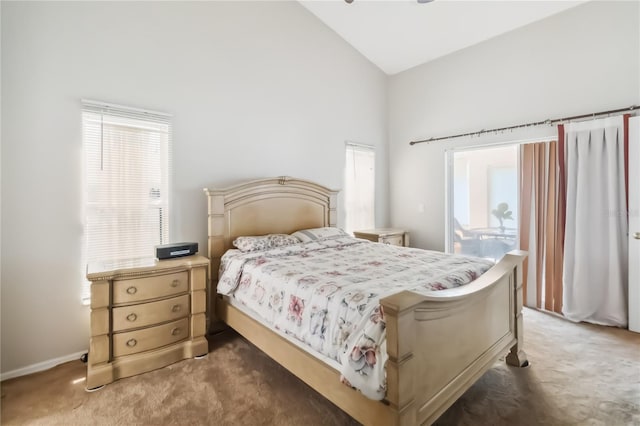 2481 Deer Creek Blvd, Saint Cloud, FL 34772 - bedroom featuring light carpet, multiple windows, and high vaulted ceiling