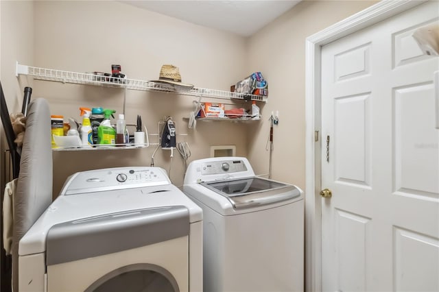 2481 Deer Creek Blvd, Saint Cloud, FL 34772 - laundry area with independent washer and dryer