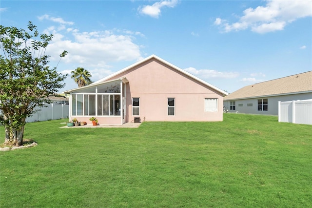 2481 Deer Creek Blvd, Saint Cloud, FL 34772 - rear view of property with stucco siding and a sunroom