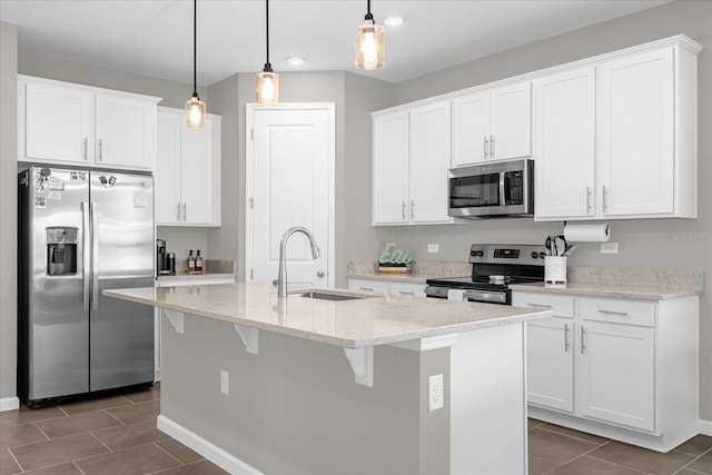 284 White Heron Way, Saint Cloud, FL 34772 - kitchen featuring stainless steel appliances, a sink, white cabinetry, dark tile patterned floors, and recessed lighting