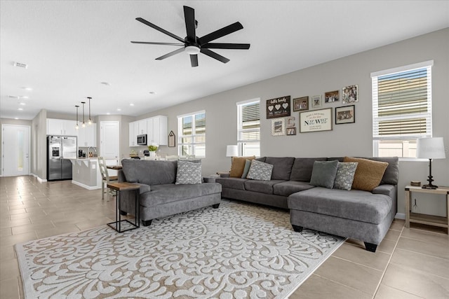 284 White Heron Way, Saint Cloud, FL 34772 - living room with light tile patterned floors, ceiling fan, recessed lighting, and baseboards