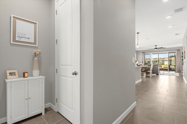 284 White Heron Way, Saint Cloud, FL 34772 - hall featuring tile patterned flooring and baseboards
