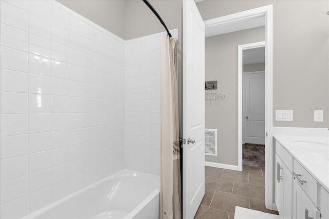 284 White Heron Way, Saint Cloud, FL 34772 - full bathroom with shower / bathtub combination with curtain, tile patterned floors, baseboards, and vanity