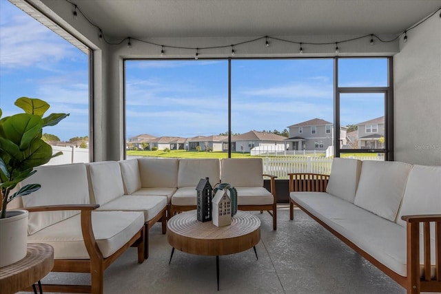 284 White Heron Way, Saint Cloud, FL 34772 - sunroom / solarium featuring a residential view and rail lighting