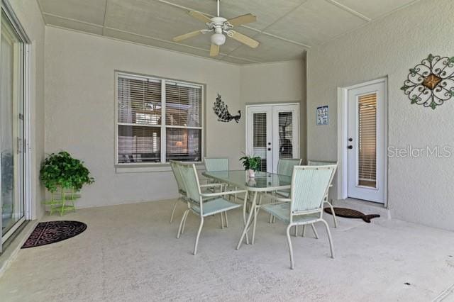 236 Boxwood Dr, Davenport, FL 33837 - view of patio with a ceiling fan, french doors, and outdoor dining area