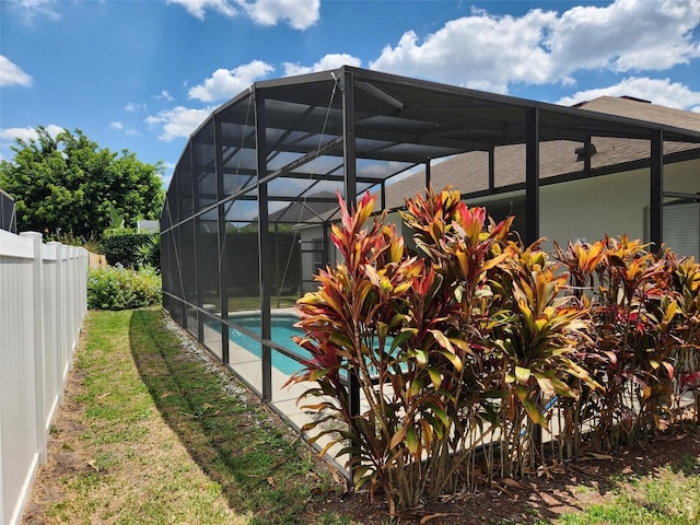 236 Boxwood Dr, Davenport, FL 33837 - back of property featuring a lanai