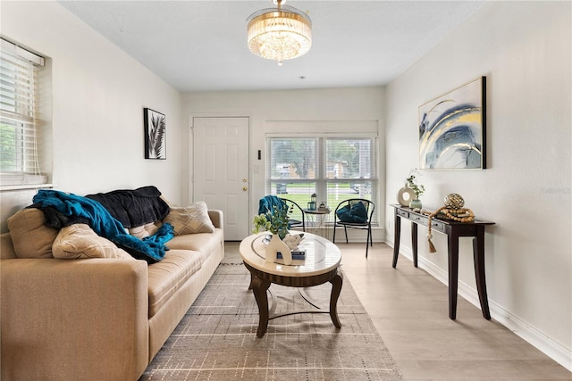 5115 W Livingston St, Orlando, FL 32811 - living room with a chandelier and wood finished floors
