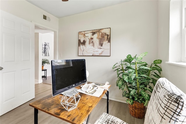 5115 W Livingston St, Orlando, FL 32811 - home office featuring wood finished floors and baseboards