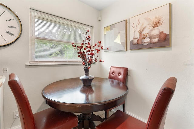 5115 W Livingston St, Orlando, FL 32811 - dining room with baseboards
