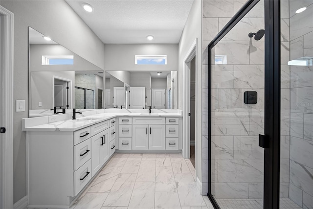 3944 SW 130th Loop, Ocala, FL 34473 - full bath with marble look tile flooring, a marble finish shower, double vanity, and recessed lighting