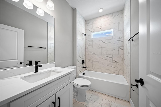 3944 SW 130th Loop, Ocala, FL 34473 - bathroom with marble look tiles, vanity, toilet, and bathing tub / shower combination