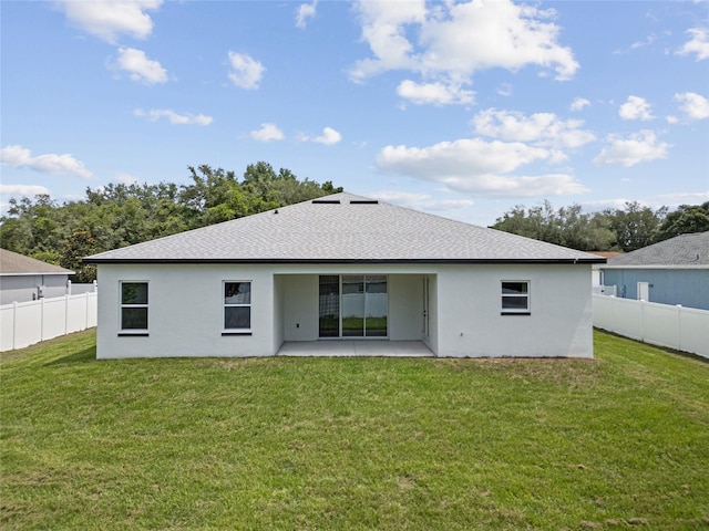3944 SW 130th Loop, Ocala, FL 34473 - rear view of house featuring a patio, stucco siding, and a shingled roof