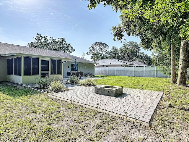 3104 Lime Tree Dr, Edgewater, FL 32141 - view of yard featuring a fire pit and a patio