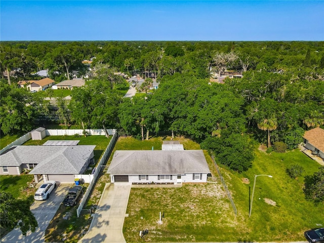 3104 Lime Tree Dr, Edgewater, FL 32141 - view from above of property with a forest
