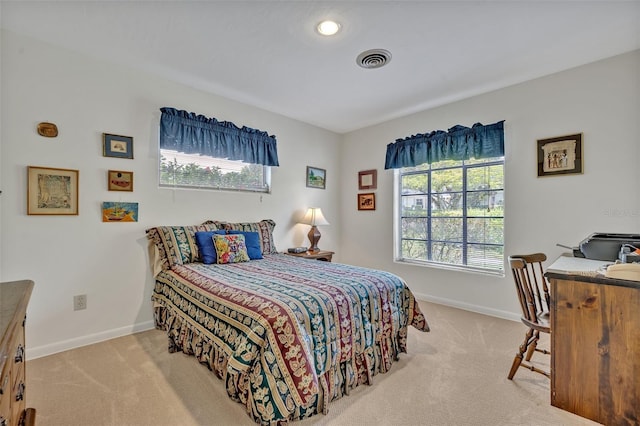 2040 Mohawk Trl, Maitland, FL 32751 - bedroom with carpet floors, multiple windows, and baseboards