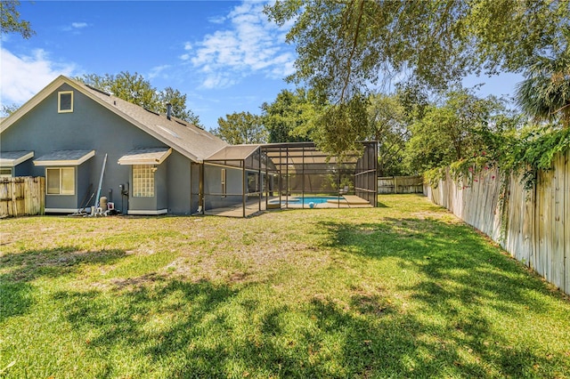 7838 Rollingridge Ct, Orlando, FL 32835 - view of yard featuring a lanai