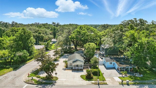 205 S Highland Ave, Apopka, FL 32703 - aerial view of property and surrounding area featuring a forest