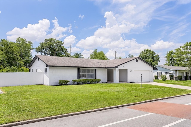 2903 Clear Way, Orlando, FL 32805 - ranch-style home featuring driveway, a garage, and roof with shingles