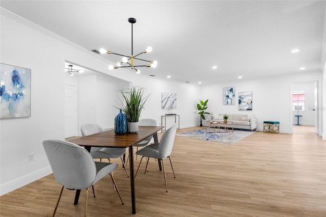 2903 Clear Way, Orlando, FL 32805 - dining space with a chandelier, light wood-style floors, recessed lighting, and ornamental molding