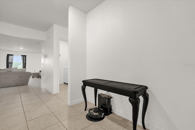 123 Zinnia Ln W, Poinciana, FL 34759 - hall with light tile patterned floors and baseboards