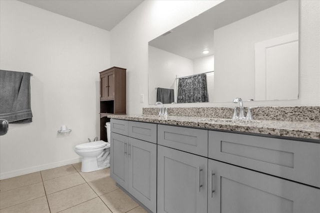 123 Zinnia Ln W, Poinciana, FL 34759 - full bath featuring double vanity, toilet, tile patterned floors, a shower with shower curtain, and baseboards