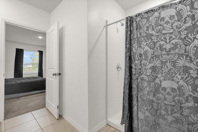 123 Zinnia Ln W, Poinciana, FL 34759 - full bathroom featuring a shower with curtain, tile patterned flooring, and baseboards