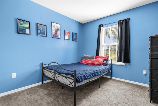 123 Zinnia Ln W, Poinciana, FL 34759 - bedroom with carpet and baseboards