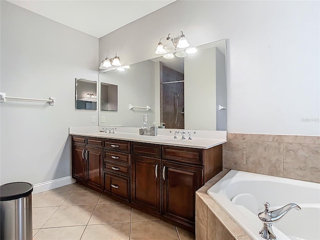 3213 Kentshire Blvd, Ocoee, FL 34761 - bathroom with a bath, double vanity, tile patterned flooring, baseboards, and a shower