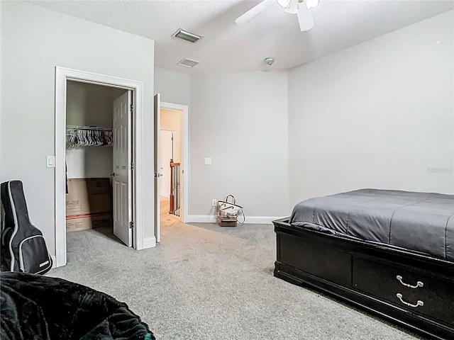 3213 Kentshire Blvd, Ocoee, FL 34761 - carpeted bedroom with baseboards, ceiling fan, a walk in closet, and a closet
