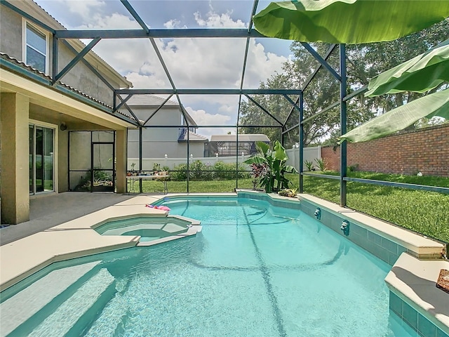 3213 Kentshire Blvd, Ocoee, FL 34761 - view of pool with a pool with connected hot tub, a patio area, and glass enclosure