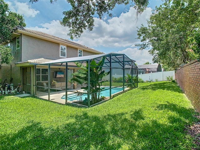 3213 Kentshire Blvd, Ocoee, FL 34761 - back of property featuring stucco siding, a patio area, and a lanai