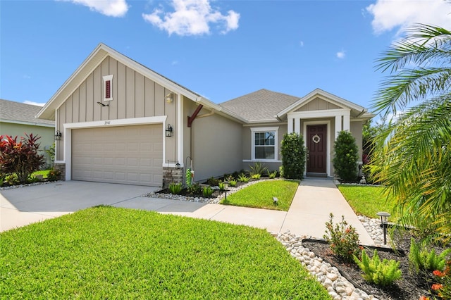 2941 Marlberry Ln, Clermont, FL 34714 - view of front facade featuring an attached garage, board and batten siding, driveway, a front lawn, and roof with shingles