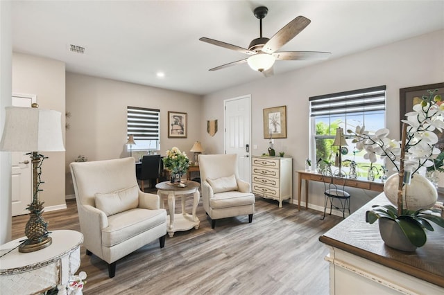 2941 Marlberry Ln, Clermont, FL 34714 - living area with light wood finished floors, ceiling fan, healthy amount of natural light, and recessed lighting