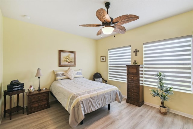 2941 Marlberry Ln, Clermont, FL 34714 - bedroom featuring light wood finished floors and a ceiling fan