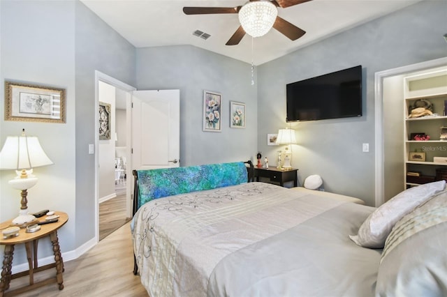 2941 Marlberry Ln, Clermont, FL 34714 - bedroom featuring light wood finished floors, a ceiling fan, and vaulted ceiling