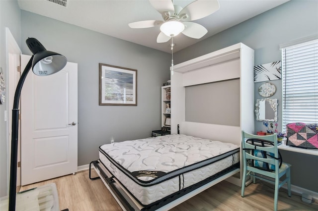 2941 Marlberry Ln, Clermont, FL 34714 - bedroom with light wood-type flooring and a ceiling fan