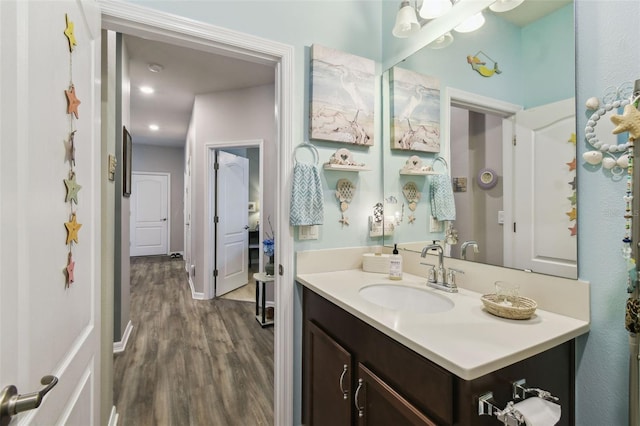 2941 Marlberry Ln, Clermont, FL 34714 - bathroom with wood finished floors and vanity