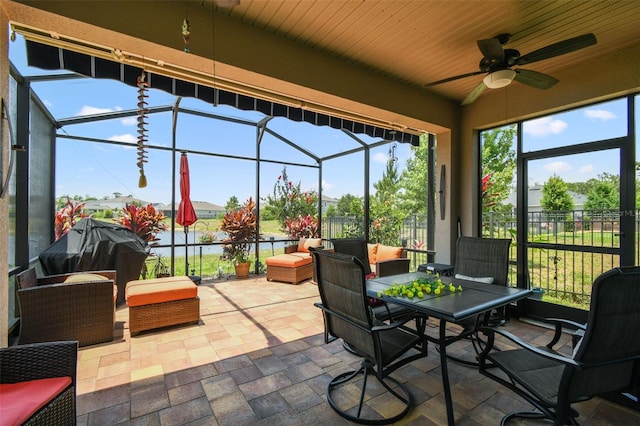 2941 Marlberry Ln, Clermont, FL 34714 - view of patio / terrace featuring an outdoor living space, glass enclosure, ceiling fan, and a grill