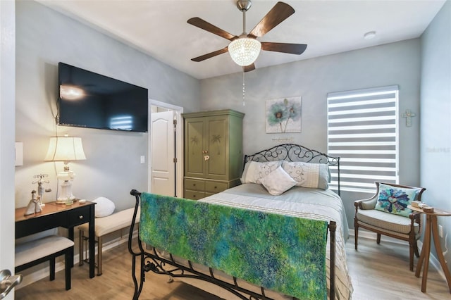 2941 Marlberry Ln, Clermont, FL 34714 - bedroom with light wood-type flooring and ceiling fan