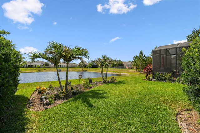 2941 Marlberry Ln, Clermont, FL 34714 - view of green lawn with a water view and a lanai
