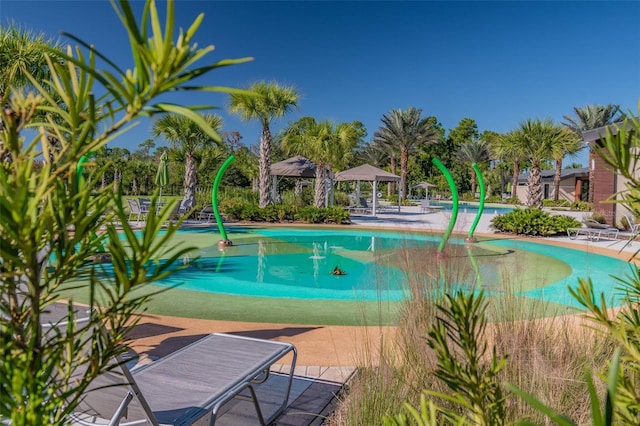 2941 Marlberry Ln, Clermont, FL 34714 - community pool featuring a gazebo and a patio