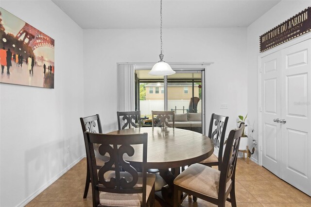 30245 Cheval St, Mount Dora, FL 32757 - dining space with light tile patterned floors and baseboards