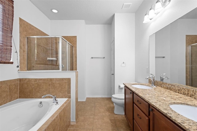 30245 Cheval St, Mount Dora, FL 32757 - full bath with a shower stall, a garden tub, double vanity, toilet, and tile patterned flooring