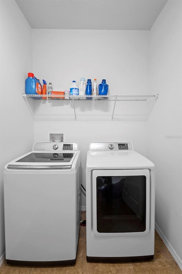 30245 Cheval St, Mount Dora, FL 32757 - laundry room featuring washer and clothes dryer and baseboards