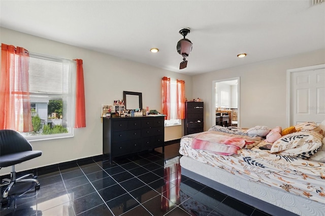 4208 Lugano Ct, Kissimmee, FL 34746 - bedroom with recessed lighting and dark tile patterned flooring
