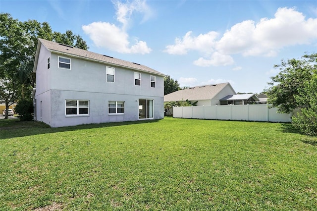 4208 Lugano Ct, Kissimmee, FL 34746 - back of property with stucco siding