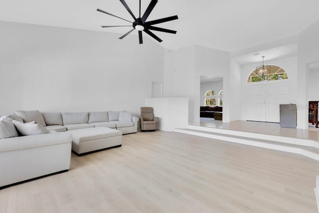 5913 Masters Blvd, Orlando, FL 32819 - living area with a high ceiling, wood finished floors, and ceiling fan