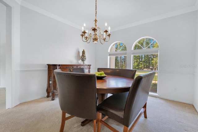 5913 Masters Blvd, Orlando, FL 32819 - dining area featuring light carpet, plenty of natural light, a chandelier, and crown molding